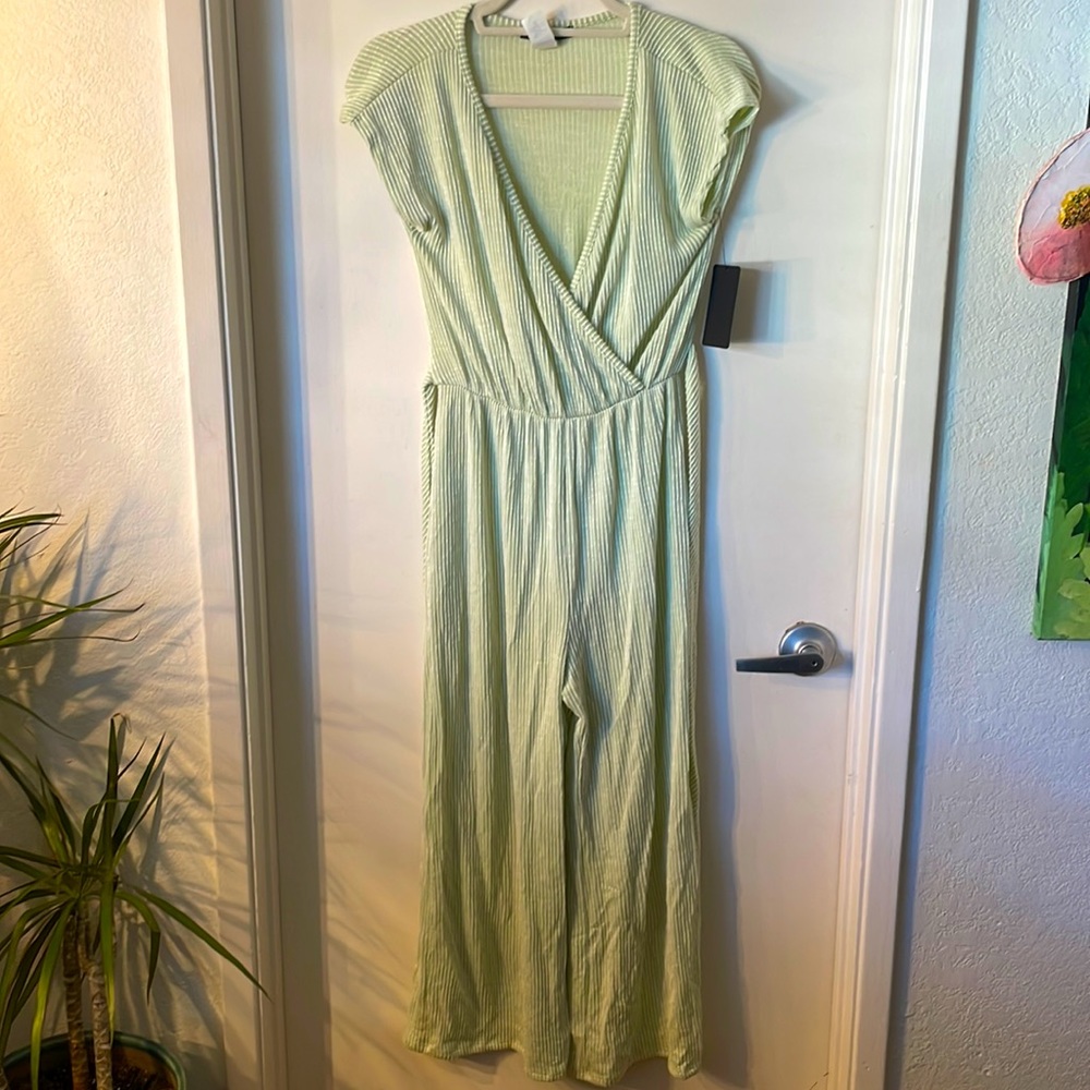 Green and white striped jumper